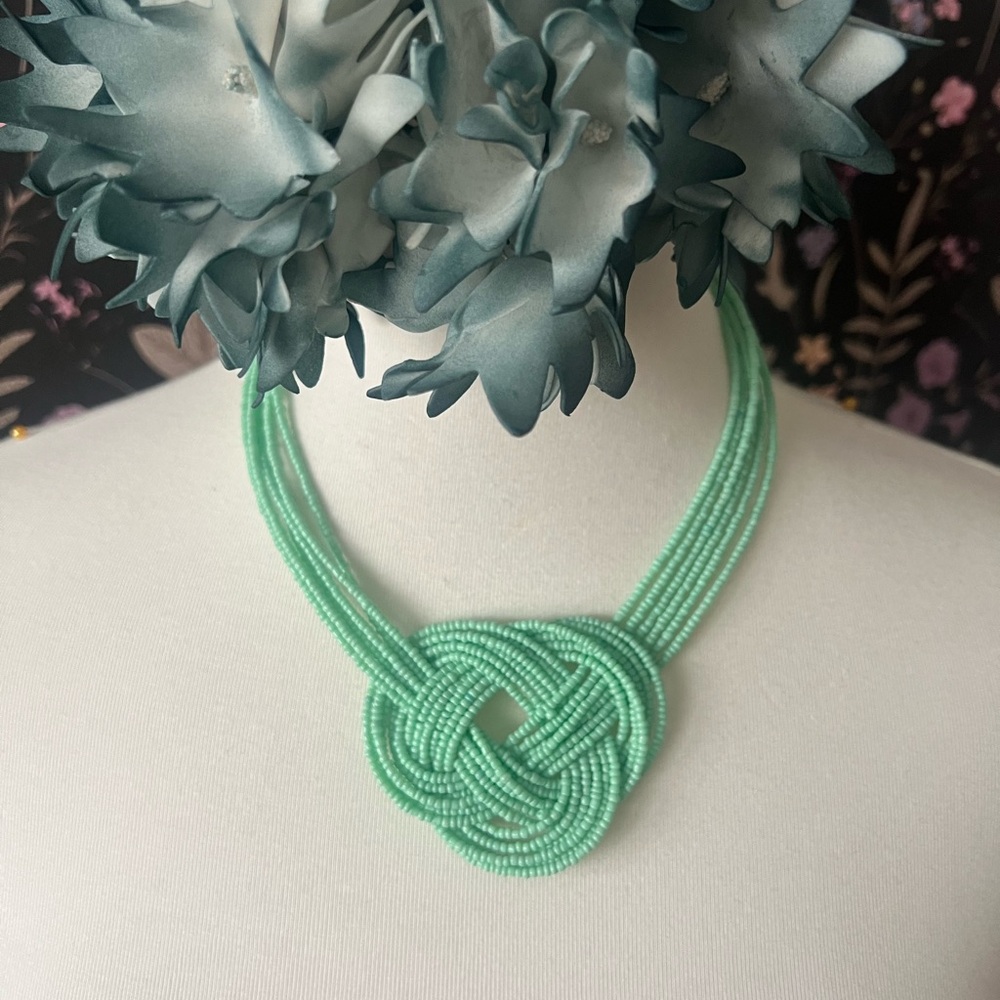 Pale green necklace, beaded with knot